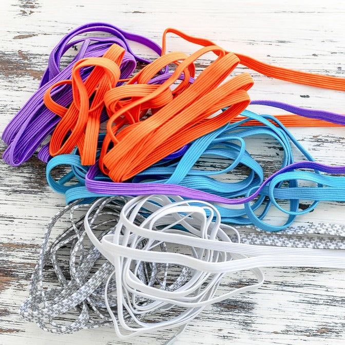 synxlace no tie laces in purple, blue, orange, white, reflect white, easy to fit, durable elastic, wide range of colours, suitable for everyone of any age and for all activities including running, cycling, hiking and walking