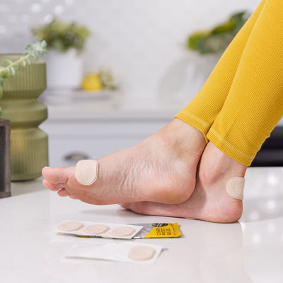 lady wearing synxgeli moleskin protectors for callus, blisters and bunions