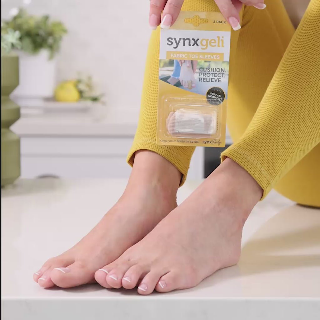 video of lady wearing a synxgeli fabric toe sleeve on her second toe ideal for reducing or preventing corns, callus, blisters, toe deformities & nail trauma